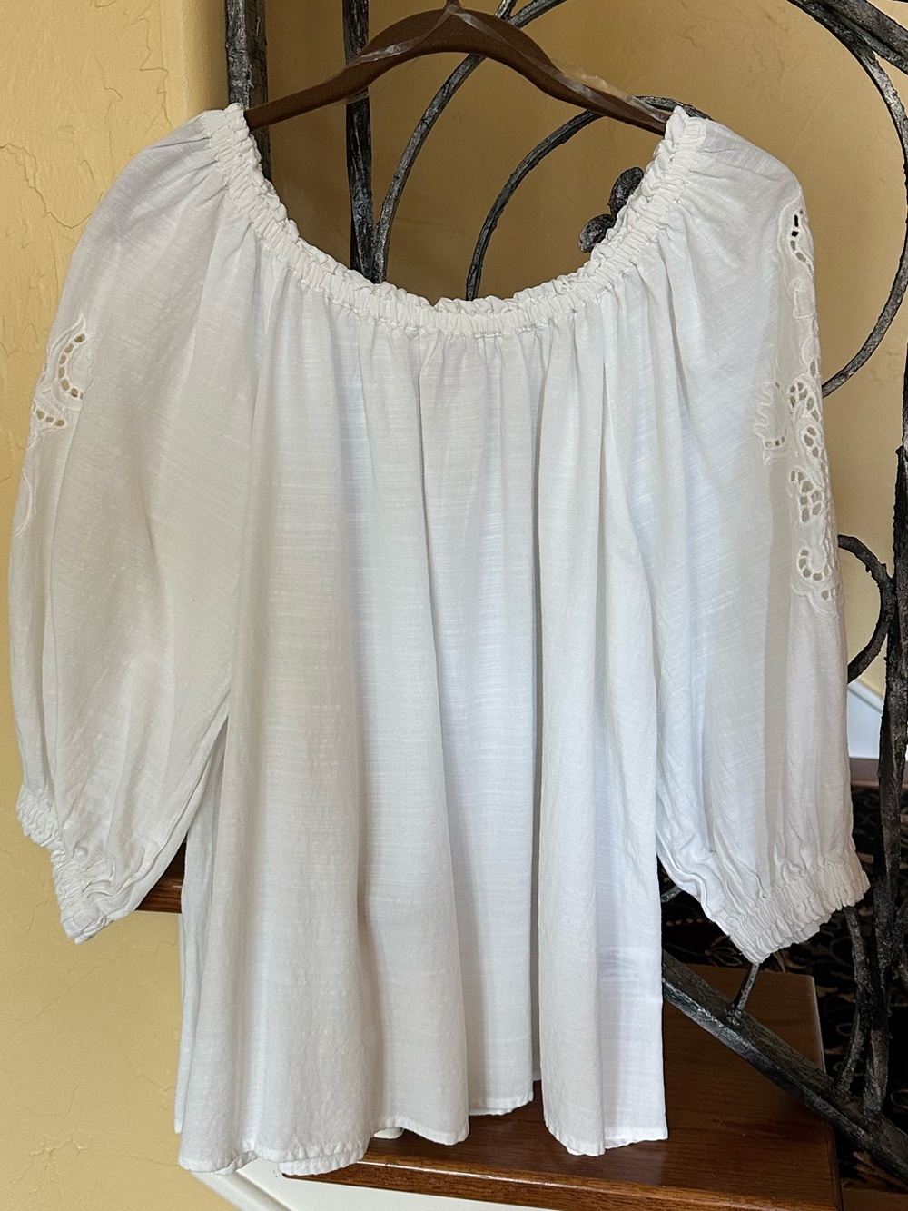 Pretty white blouse with cut out lace sleeves